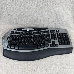 Microsoft Wireless Comfort Keyboard 4000 Ergonomic USB Model 1045 Silver Black‎